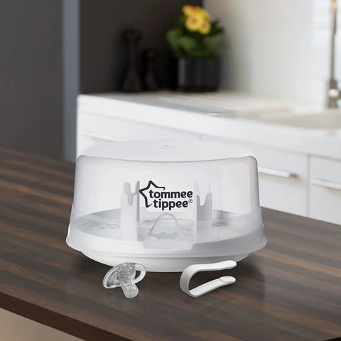 Tommee Tippee Breastfeeding Kit with Manual Breast Pump, Microwave Steriliser, Baby Bottles and Breastfeeding Accessories Tommee Tippee