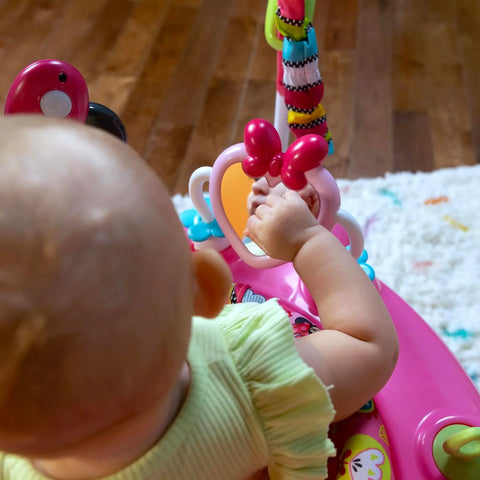 Bright Starts Disney Baby MINNIE MOUSE PeekABoo Baby Activity Center Jumper with 8 Toys, Lights & Sounds, 360-Degree Seat, 6-12 Months Pink Disney